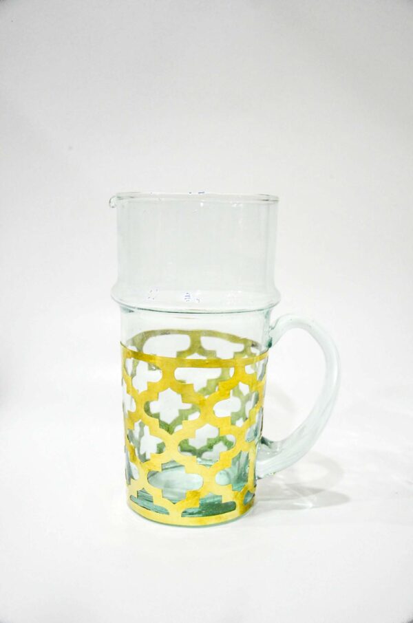 Blown glass carafe covered with graven mailleshort