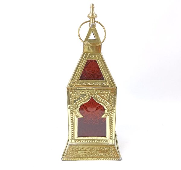 brass lantern with green glass
